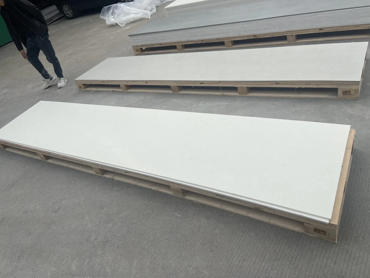 Stacked marble-inspired solid surface sheets prepared for fabrication