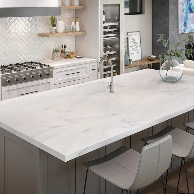 Light solid surface kitchen island with a continuous worktop